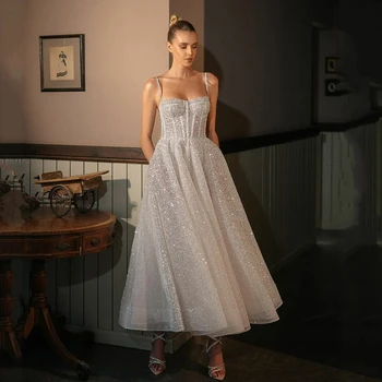 Blizgančios mielosios princesės vestuvinės suknelės su spagečių dirželiais Seksualios kulkšnies ilgio Boho nuotakos suknelės 2023