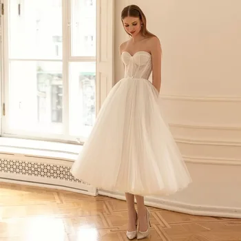 Miela vidutinio blauzdos vestuvinė suknelė 2024 m. 