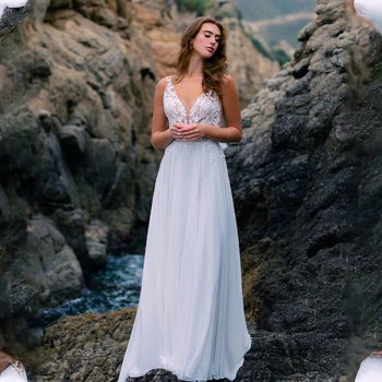 Žavinga V formos kaklo nėrinių aplikacija Boho Beach A linijos vestuvinės suknelės šlavimo traukinys pagal užsakymą pagamintas 2024 m. Vestido De Noival